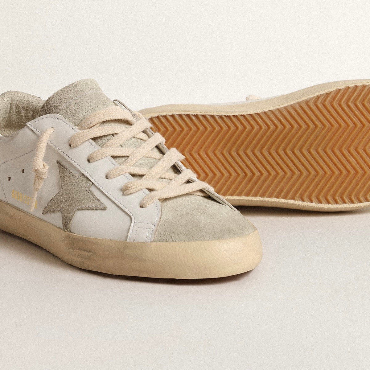 Golden Goose Super-Star with gray star and silver glitter heel tab(Women's)